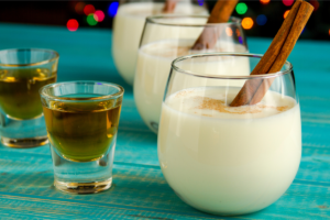 Brazilian jaguar's milk cocktail drinks on teal tabletop