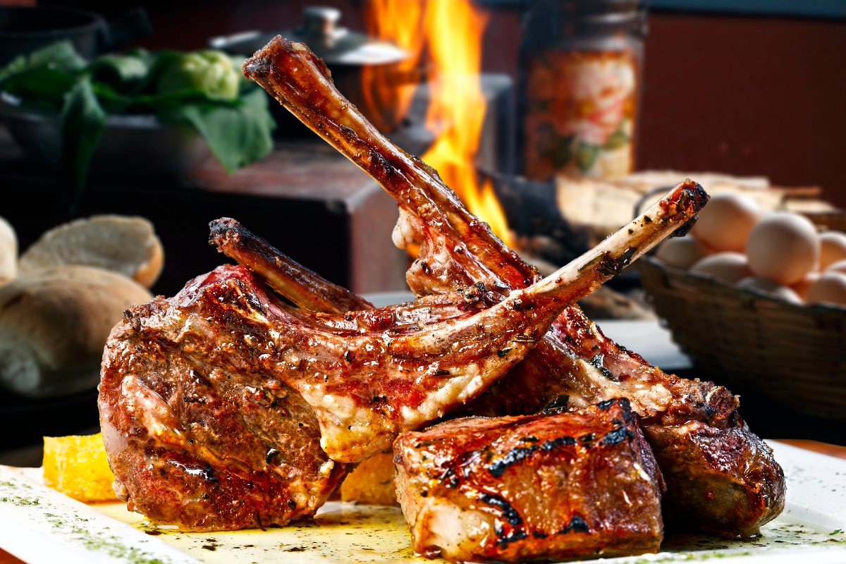 grilled rack of lamb arranged on a plate